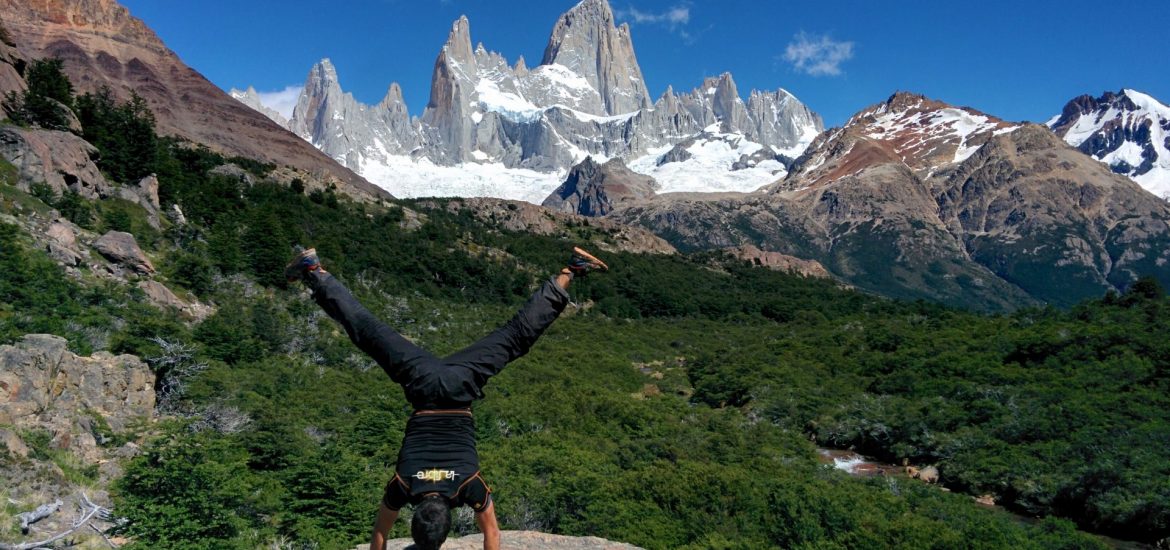 The author doing a figure with the Fitz Roy mountain in the background.