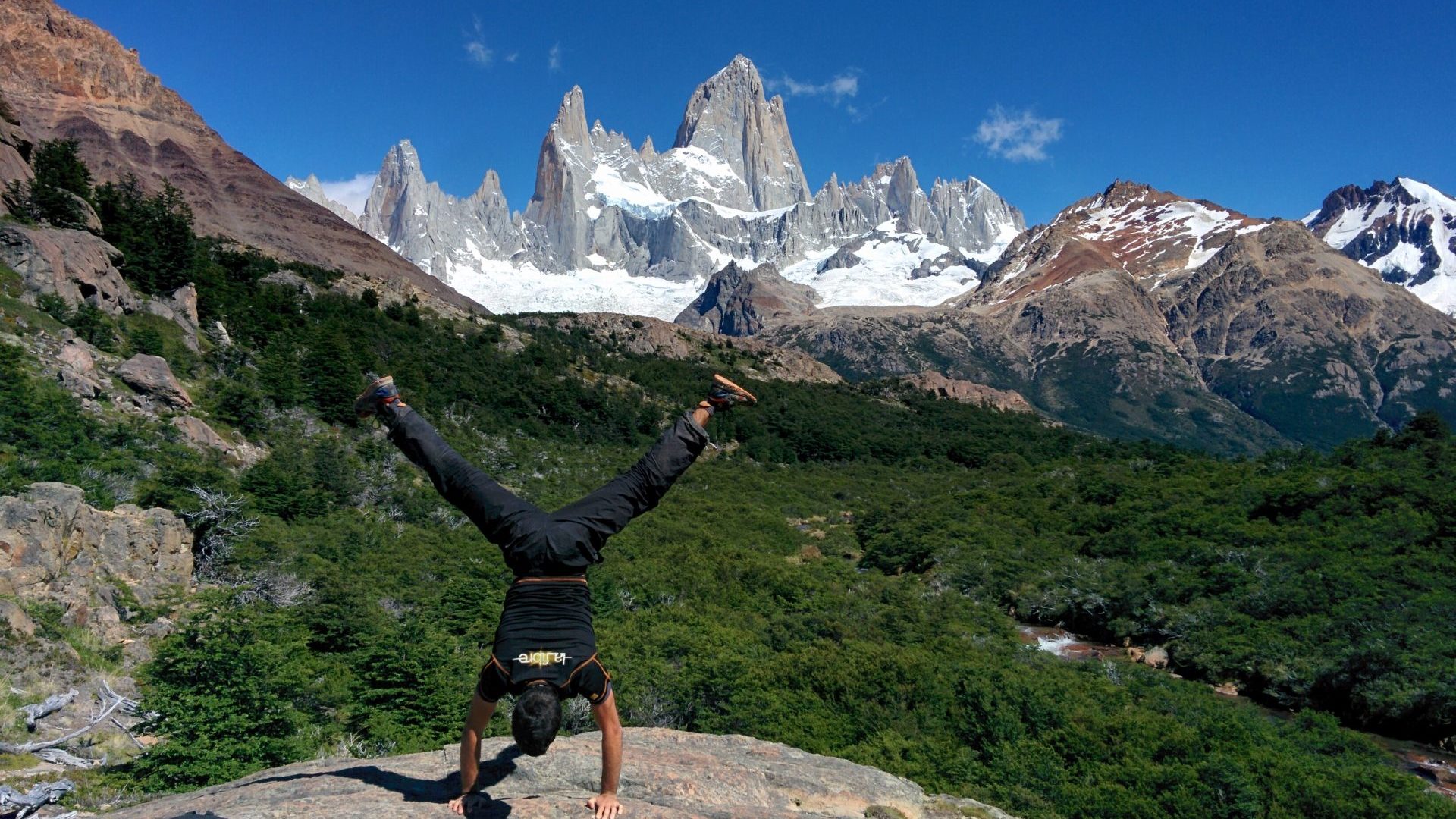 The author doing a figure with the Fitz Roy mountain in the background.