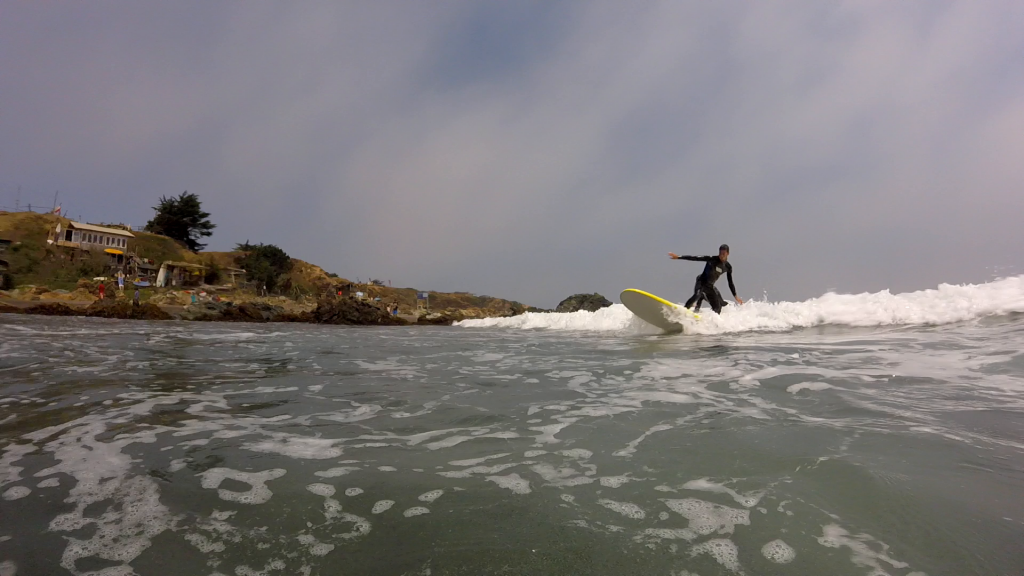 Me surfing a wave.