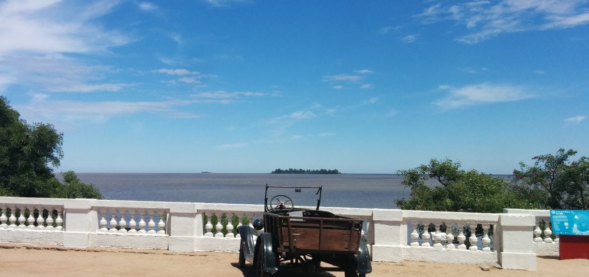 A view of the river with an old car