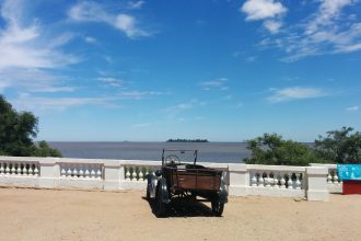 A view of the river with an old car