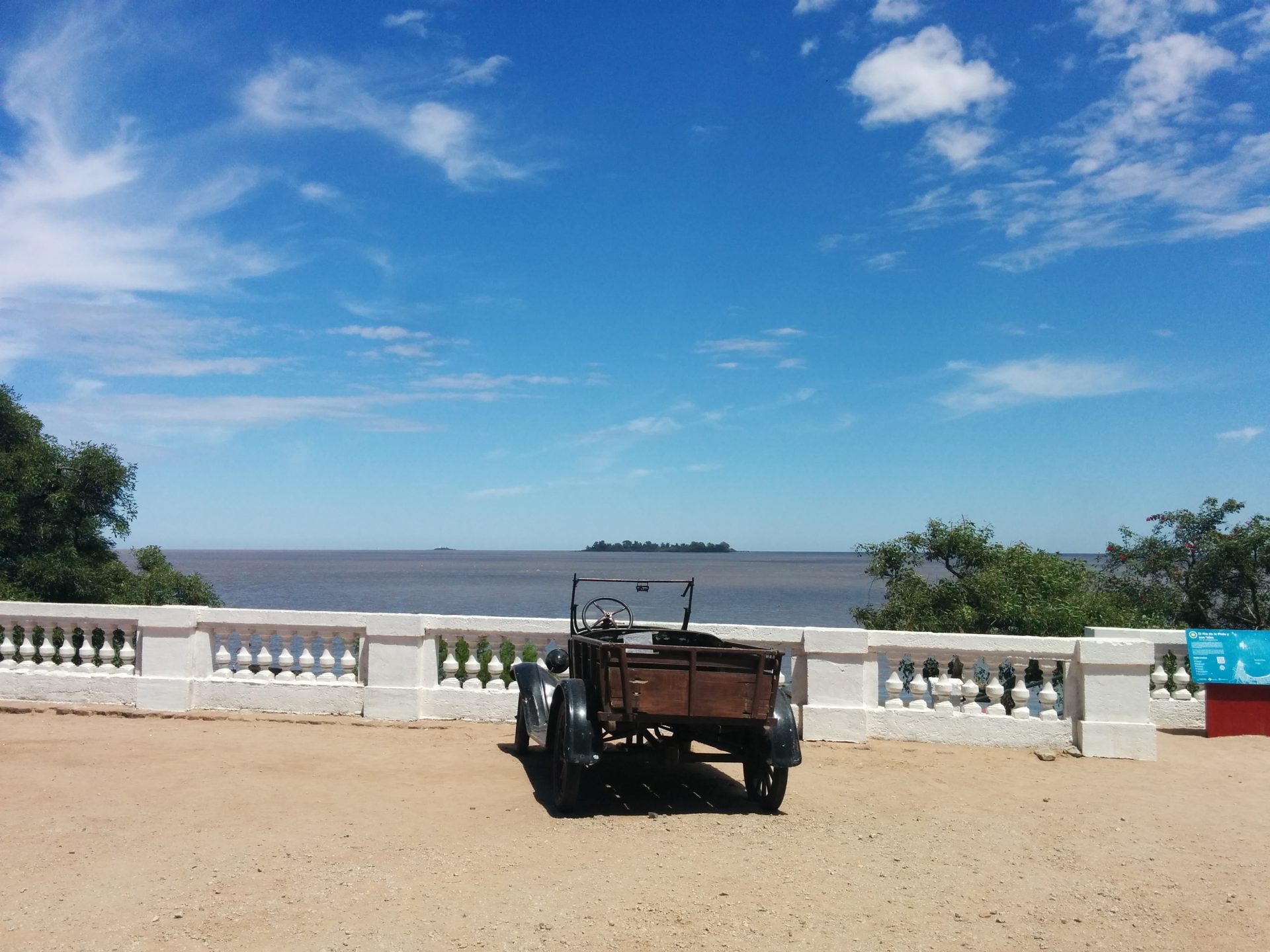 A view of the river with an old car