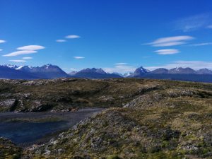 A island with the mountains in the background