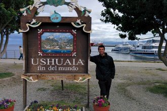 Me with the sign that said Ushuaia fin del Mundo