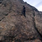 Doing rock climbing
