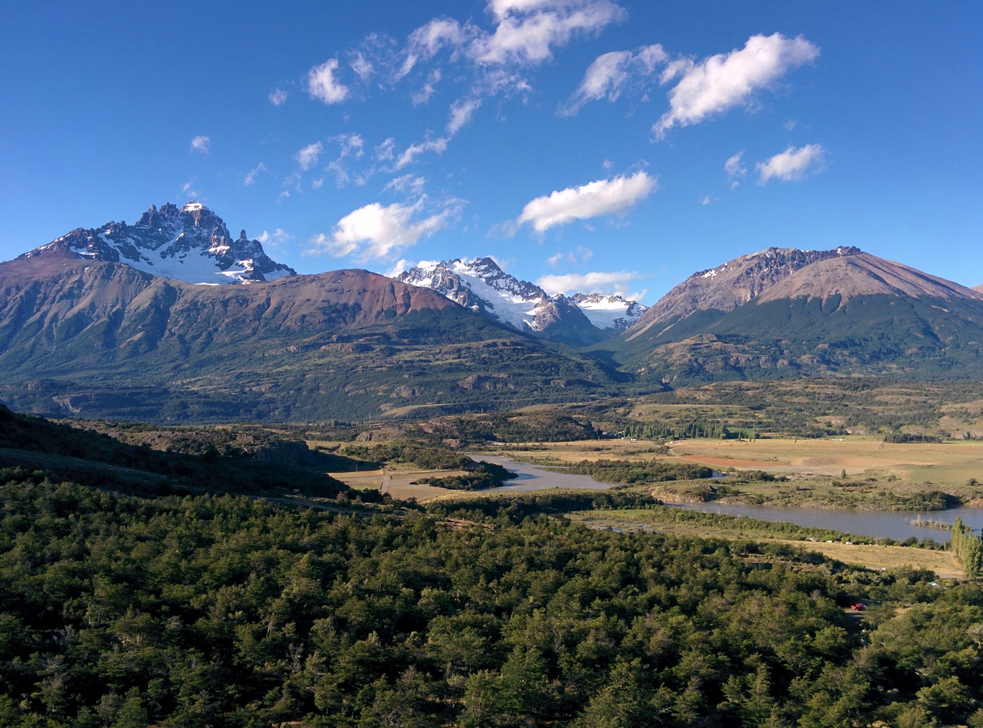 A valley with the Cerro Castillo mountain behind