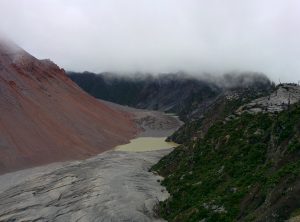 On the left there the final part of the volcano and on the right the devastated forest. And in between, a ditch.