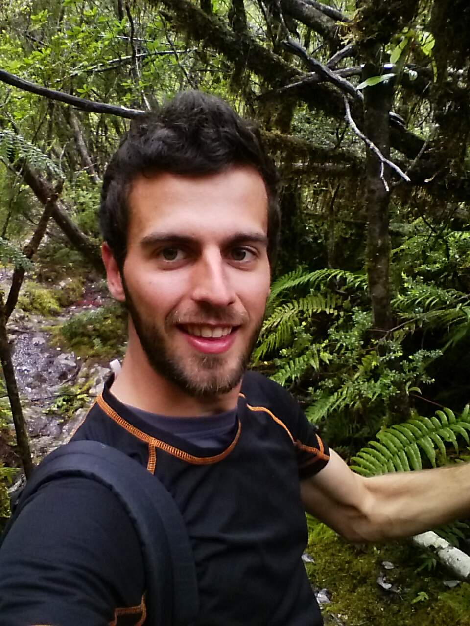 Selfie of me with the rain forest behind me