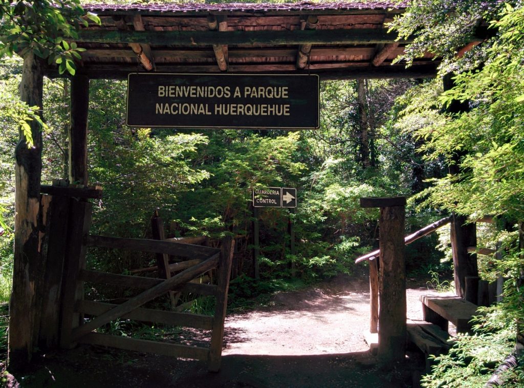 A wood gate to enter in the forest.