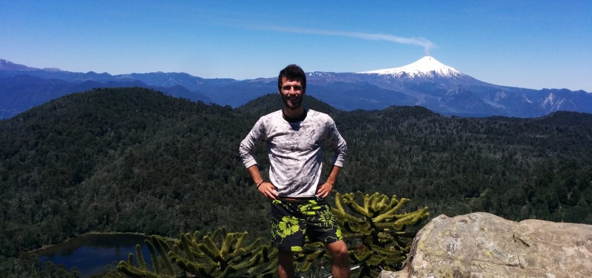 Me in front of the overview of the valley and the villarica volcano