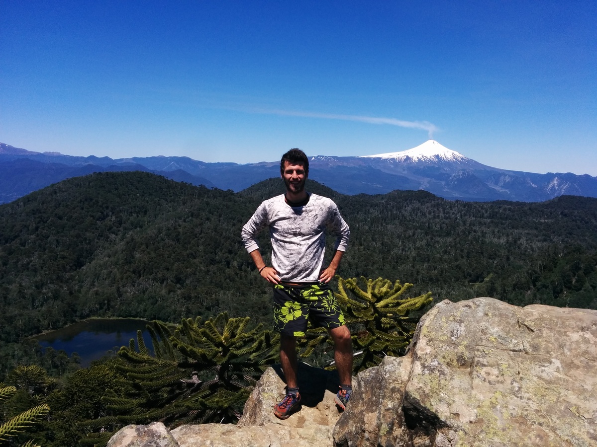 Me in front of the overview of the valley and the villarica volcano