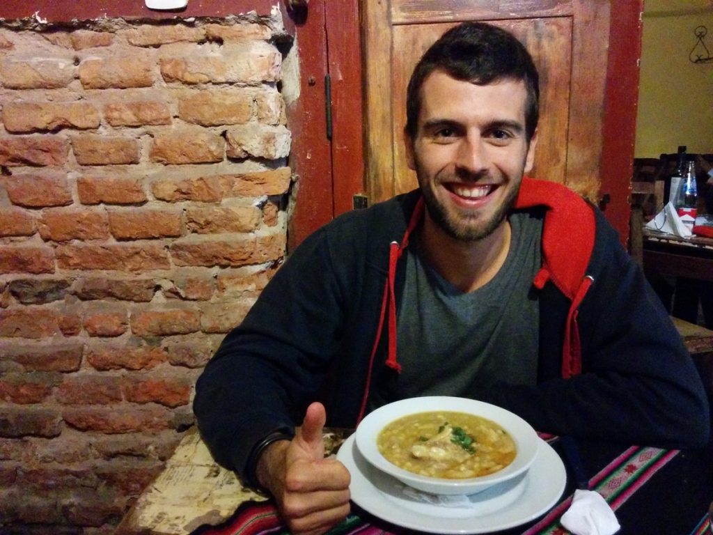 A meal with bean, corn, pumpkin and meat.