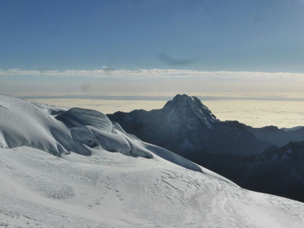 On the way back, close to the top, a sea clouds in the background