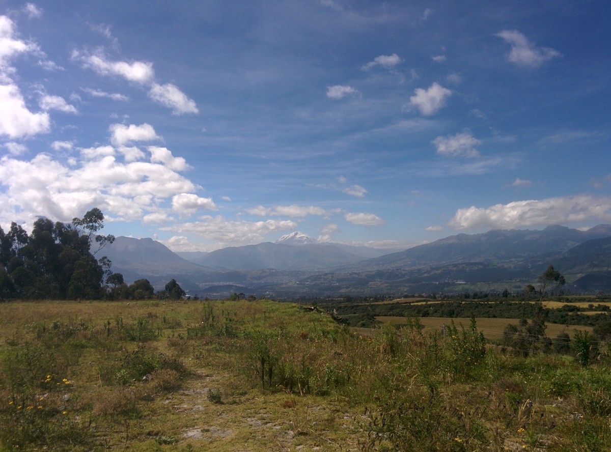 The valley with the Cayambe volcano at the bottom